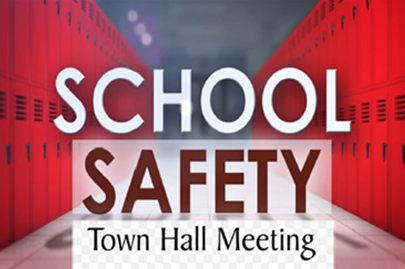 Lockers in hallway with School Safety Town Hall Meeting title