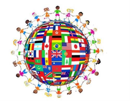 Children holding hands around globe made of international flags